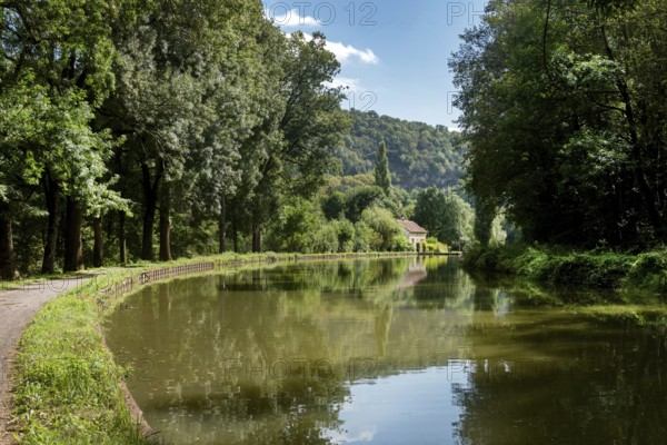 Beautiful landscape view of the Canal Bourgogne, the Burgundy Canal between Pouilly-en-Auxois and Dijon, popular with cyclists following the Eurovelo cycle path known as the Rivers Route, France