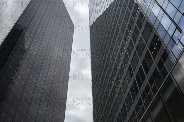 Abstract view of high rise glass fronted office buildings in a Paris commercial and financial district, France