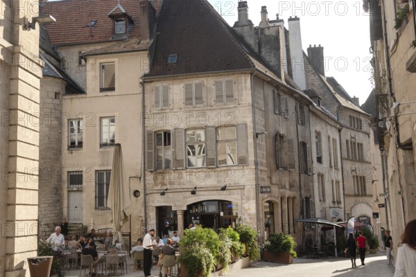 Dole, France. September 20th 2024 Café culture and beautiful architecture of Dole in the Jura region of France beside the River Doubs and Rhine-Rhone canal, a historical city located southeast of Dijon, France