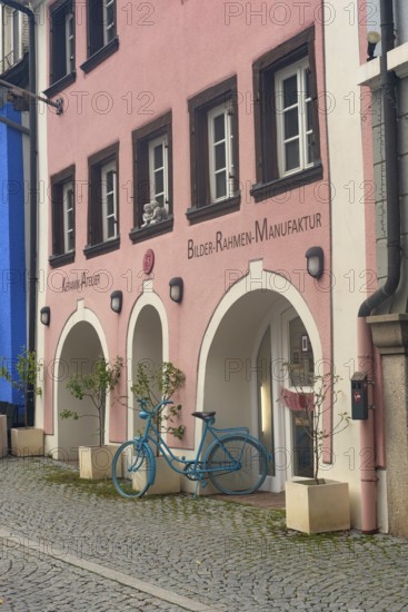 Donaueschingen, Germany. 28th September 2024 Colourful shops and cafes on the twon square of Donaueschingen, official source of the River Danube, Germany