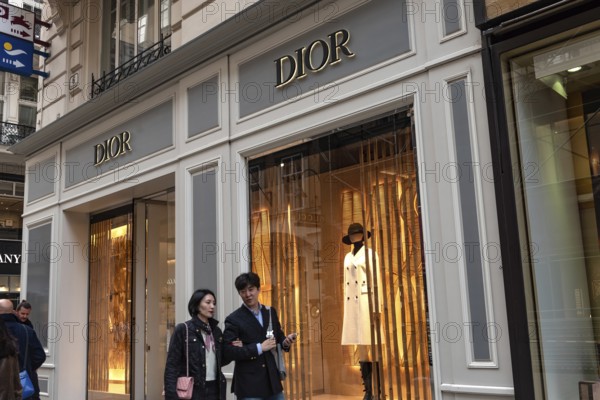 Vienna, Austria. October 15th 2024 Shoppers outside Dior shop, luxury fashion brand in central Vienna shopping district, Austria