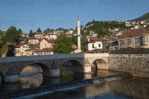 Sarajevo, Bosnia and Herzegovina. July 24th 2019 The Seher-Cehaja Bridge stone bridge crossing the Miljacka River in Sarajevo, Bosnia and Herzegovina