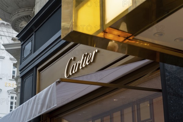 Vienna, Austria. October 15th 2024 Cartier logo and brand sign displayed on a Vienna store front, in the central shopping district of Vienna city centre, Austria