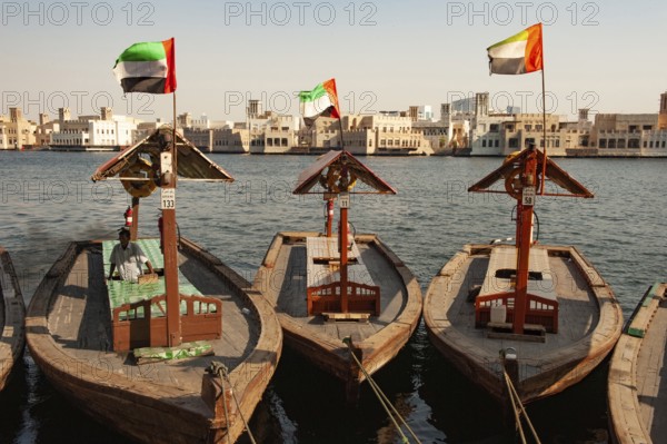 Dubai, United Arab Emirates. July 1st 2019 Traditional local water taxis moored at the harbour of Dubai Creek, Deira, United Arab Emirates