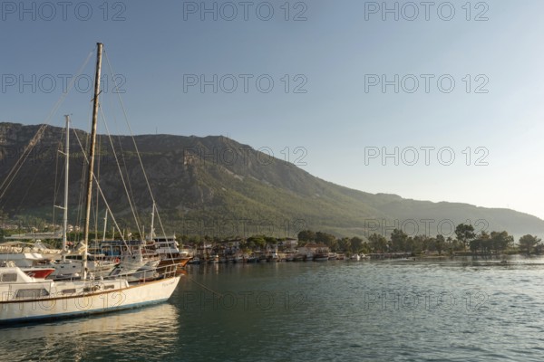 Akyaka, Mugla, Turkey. September 8th 2022 Boats moored in the beautiful harbour at the entrance to the Azmak River, at the Turkish Riviera seaside town of Akyaka on the south west coast of Turkey