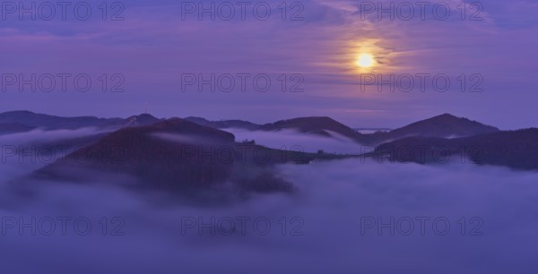 View from the Gisliflue of the Jurassic foothills covered in fog from the left, Wasserfluh, Summerholde, Asperstrihen, Strihen, in the light of a full moon, Talheim, Canton, Aargau, Switzerland