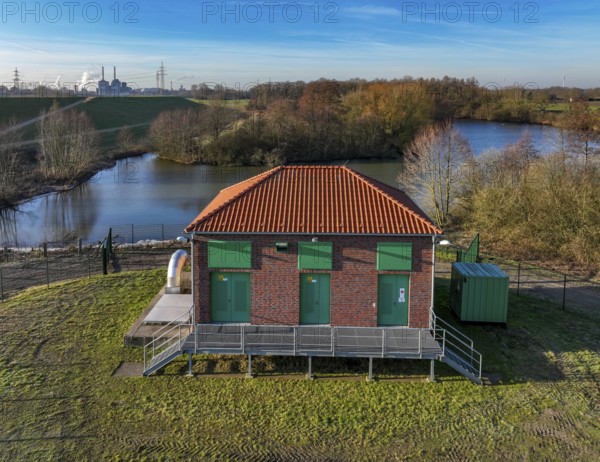 Haltern-Marl, North Rhine-Westphalia, Germany - Lippe, flood protection in the Haltern-Lippramsdorf-Marl area (HaLiMa) . Flood protection on the River Lippe by relocating the dyke and thus extending the floodplain. In front, the Haltern-Meinken pumping station on the completed floodplain north, the north dyke. Work is still underway on the south dyke. In the back: Marl Chemical Park