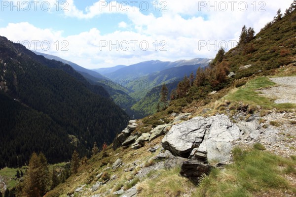 Landscape on the Transfogarasan Highway, Transfagarasan, connects the Arges Valley in Great Wallachia with the Olt Valley in Transylvania, crossing the Fagaras Mountains in the Transylvania Alps, to melt snow in May, Romania