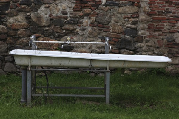 Municipality of Cristian, German Grossau, washbasin in the courtyard of the fortified church, Sibiu district in Transylvania, Romania