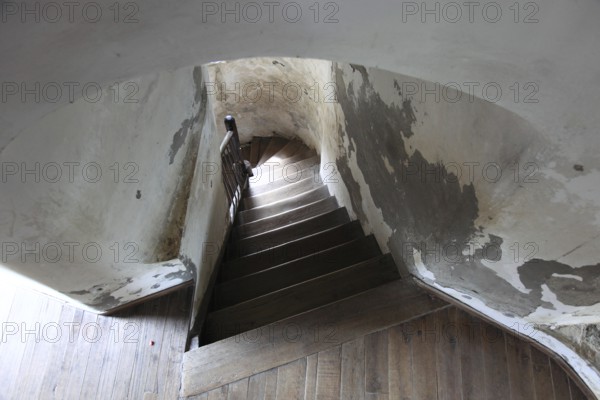 The picture shows the interior of the Chindia Tower, the staircase shown leads through the historic masonry of the tower, Turnul Chindiei, in Targoviste, Romania