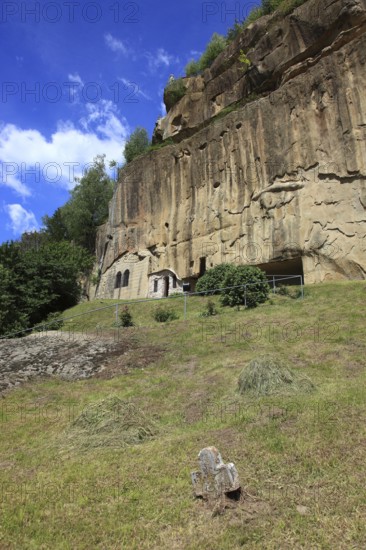 Corbii de Piatra rock monastery, stone ravens carved into a massive, 30-meter high sandstone wall, village of Jgheaburi, municipality of Corbi, in the district of Argesin, Wallachia, Romania