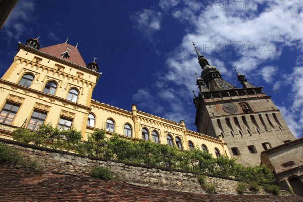 Romania, hour tower and cultural house in the historic old town of Sighisoara, German Sighisoara, town in Mures district in Transylvania, UNESCO World Heritage Site