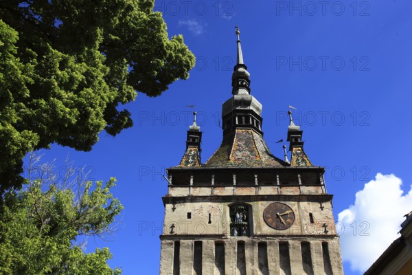 Romania, hour tower in the historic old town of Sighisoara, German Sighisoara, town in Mures district in Transylvania, UNESCO World Heritage Site