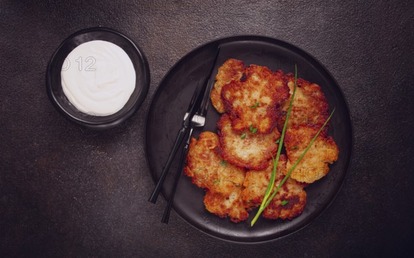 Potato pancakes, pancakes with sour cream, Belarusian dish, homemade, no people