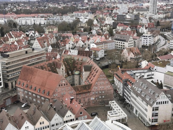 Panoramic view of a city with characteristic red roofs and modern buildings, view from Ulm Minster, Ulm