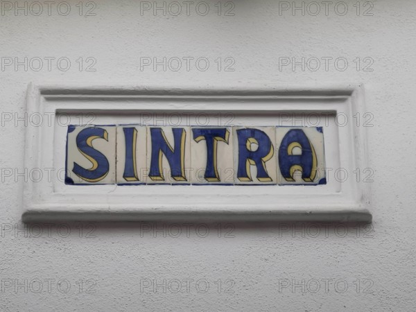 Sign with the lettering 'Sintra' on artfully painted tiles, Sintra Cascais nature park Park, Lisbon, Portugal