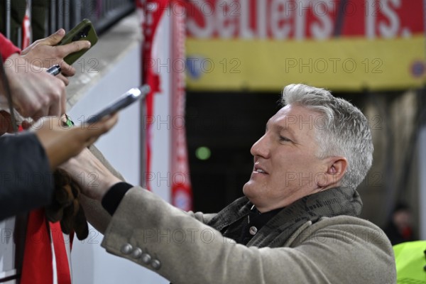 TV expert Bastian Schweinsteiger, portrait, signing autographs, soccer Bundesliga, DFB-Pokal, Allianz Arena, Munich, Bayern, Germany