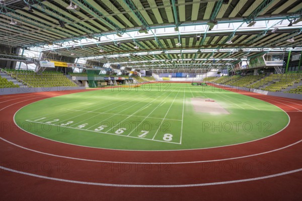Round green running track with numbered markings in a sports hall, Glaspalast Sindelfingen, Böblingen district, Germany