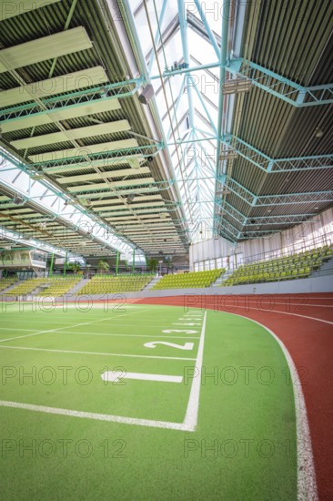 Extensive sports hall with green running track and stands, large windows, Sindelfingen Glass Palace, Böblingen district, Germany