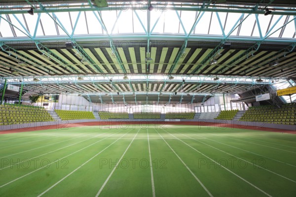 Extensive sports hall with green running track, surrounded by large windows, Sindelfingen Glass Palace, Böblingen district, Germany