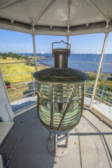 The lens of Smygehuk lighthouse and view towards Smygehamn in Trelleborg municipality, Baltic Sea, Skåne county, Sweden, Scandinavia
