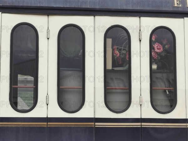 Detail of a train with four oval windows and floral decoration, Upper Franconia, Germany