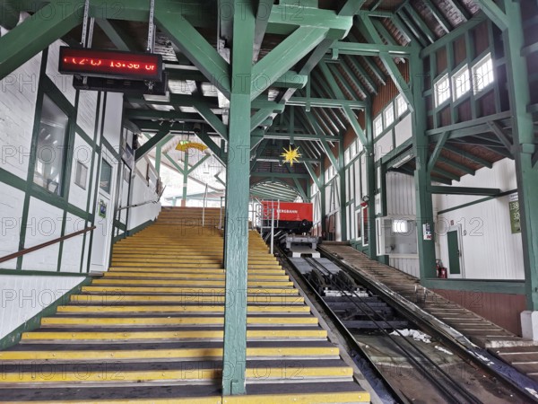 Large mountain station in wooden design with yellow stairs leads to the cable car, Oberweissbach cable car, Rennsteig, Thuringian Forest nature park Park