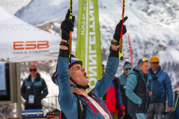 Athlete Toni Palzer with winning pose at ski touring competition Jennerstier, Skimo, Jenner, Schönau am Königssee, Berchtesgadener Land, Upper Bavaria, Bavaria, Germany