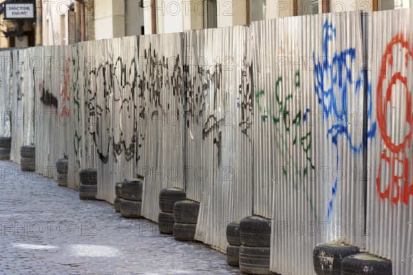 Construction fence made of corrugated iron, Lviv, Ukraine