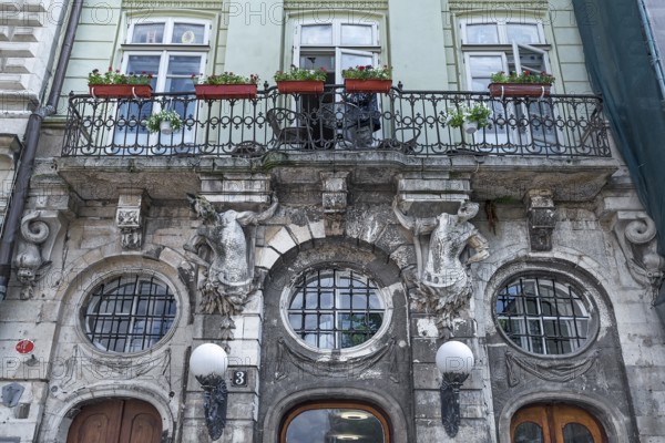 Balcony supported by atlases, 19th century house, Lviv, Ukraine