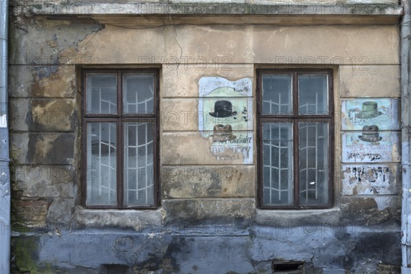 Wall painting at a former Jewish hat shop in the Jewish Quarter in Lemberg, Ukraine