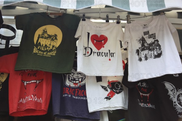 Souvenir sale at Bran Castle, marketing of Dracula, printed here on shirts, Törzburg, in Transylvania, Romania. It is famous as Dracula's Castle and one of the country's main attractions