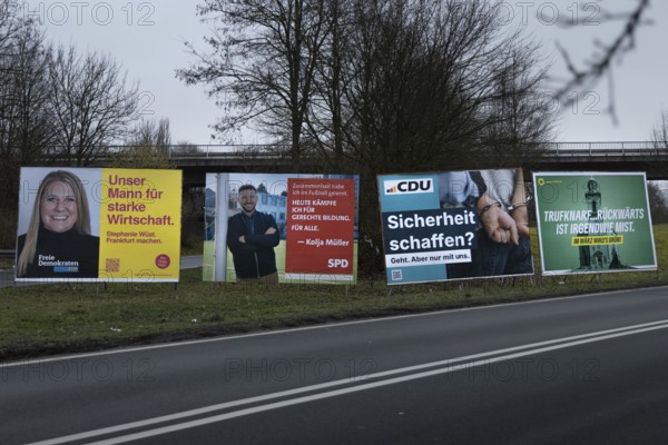 Large election posters are standing on a street in the northwest of Frankfurt. The Hessian state government has set March 15, 2026 as the election day for the local elections in Hesse. On this day, the elections of the City Council and the 16 local advisory councils will take place in Frankfurt am Main, Germany