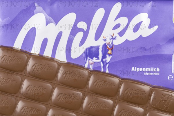 Milka chocolate bar Alpine milk chocolates with logo in Stuttgart, Germany