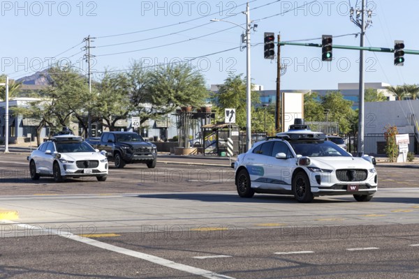 Waymo self-driving autonomous vehicles driverless cars from Google and Jaguar Robotaxi in Phoenix, USA