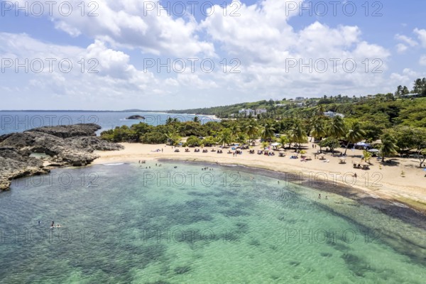 Mar Chiquita Beach in the Caribbean Ocean vacation Aerial view from above in Manati, Puerto Rico