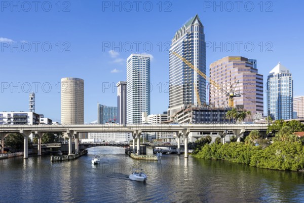 Tampa skyline with skyscrapers and bridge over Hillsborough River downtown in Tampa, USA