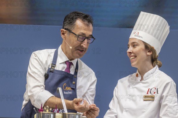 Cem is cooking! DEHOGA Baden-Württemberg event with candidate for the post of Minister-President, Cem Özdemir from the Green Party. He shows a trainee cook an injury that he has already sustained at home with a Japanese knife. Baden-Württemberg will elect a new state parliament on March 8, 2026. INTERGASTRA, leading trade fair for the hotel and catering industry. Stuttgart, Baden-Württemberg, Germany