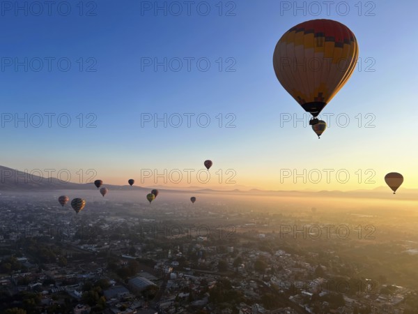Panoramic aerial view of Mexico Teotihuacan pyramids. Hot air balloons flying over the Mexican Highlands near Mexico City