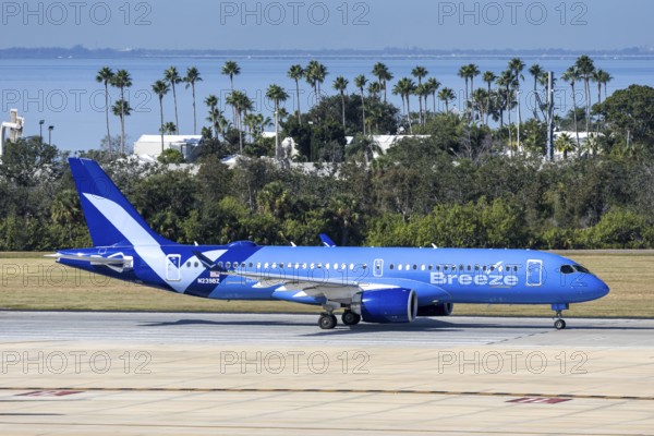 An Airbus A220-300 Breeze Airways aircraft with license plate N239BZ at Tampa airport, USA