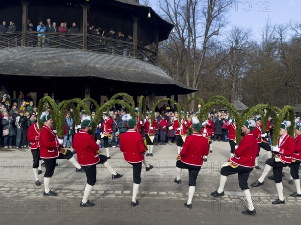 Schaeffler dance in 2026 in the English Garden, behind the Chinese Tower. The event takes place every 7 years between Epiphany and Shrove Tuesday, Munich, Bavaria, Germany