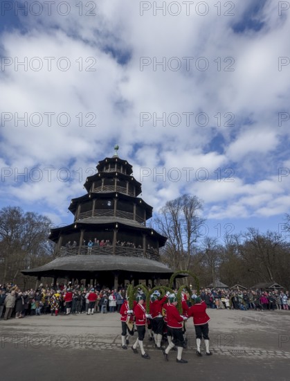 Schaeffler dance in 2026 in the English Garden, behind the Chinese Tower. The event takes place every 7 years between Epiphany and Shrove Tuesday, Munich, Bavaria, Germany