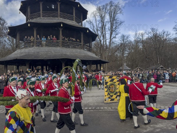 Schaeffler dance in 2026 in the English Garden, behind the Chinese Tower. The event takes place every 7 years between Epiphany and Shrove Tuesday, Munich, Bavaria, Germany