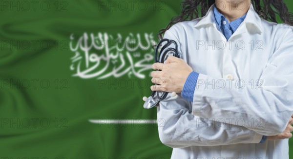 Healthcare professional with Saudi Arabia flag background. Professional doctor holding stethoscope on Saudi Arabia flag background
