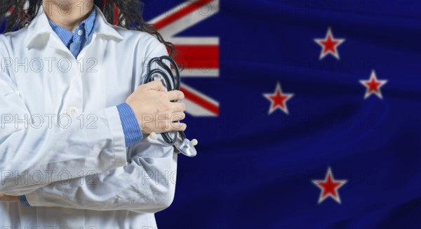Healthcare professional with New Zealand flag background. Professional doctor holding stethoscope on New Zealand flag background