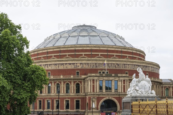 Asian Group, Albert Memorial, Prince Albert Memorial, Queen Victoria's husband in front of Royal Albert Hall concert hall, architect Captain Francis Fowke and Major General Henry Y. D. Scott, Kensington, London, England, Great Britain