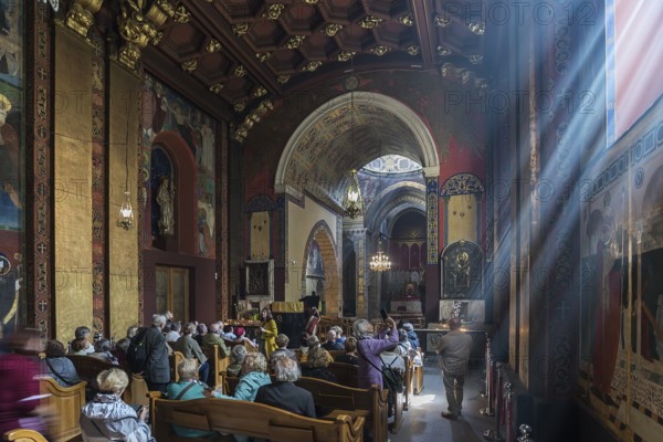 Tour groups in the chancel of the Armenian Cathedral, Lviv, Ukraine