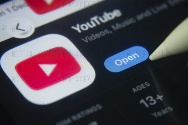 Dhaka, Bangladesh- 01 Dec 2025: A close-up of the youtube app icon in the App Store on an iPad screen