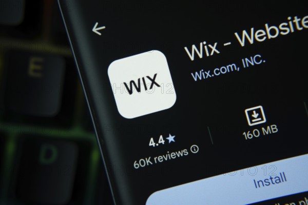 Dhaka, Bangladesh- 27 July 2025: Wix app from Google Playstore is displayed on a smartphone screen