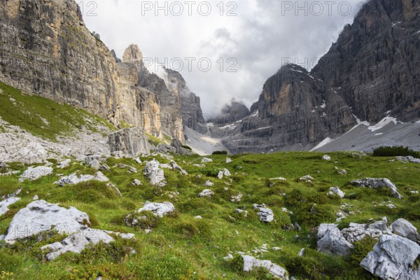 Cliffs and pinnacles in fog, Brenta Mountains, Brenta-Adamello Natural Park, Trentino, Italy